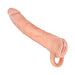 8-inch white realistic textured extender and masturbator sleeve with padded ball strap for secure fit.
