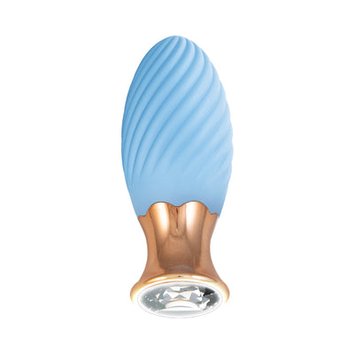 Blue silicone massager with swirl texture and rose gold base featuring a decorative clear diamond-like accent.