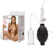 Lux Fetish clitoral pump with transparent suction cup, black ergonomic hand pump, and quick-release valve next to product packaging.