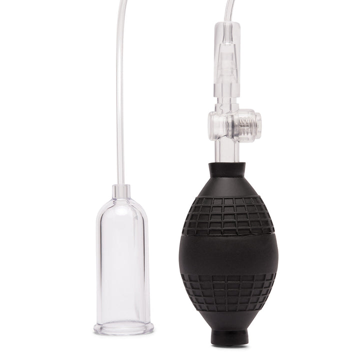 Lux Fetish clitoral pump with clear suction cup, black textured hand bulb, and quick-release valve.
