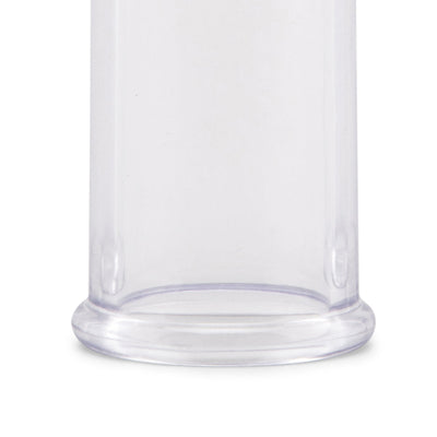Close-up of the clear cylindrical chamber of the Lux Fetish Clitoral Pump showing smooth edges and transparent design.