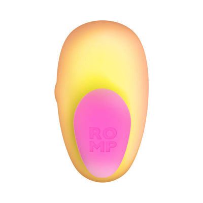 Compact ROMP Kiss clitoral suction toy in pink and coral with ergonomic shape and embossed logo.