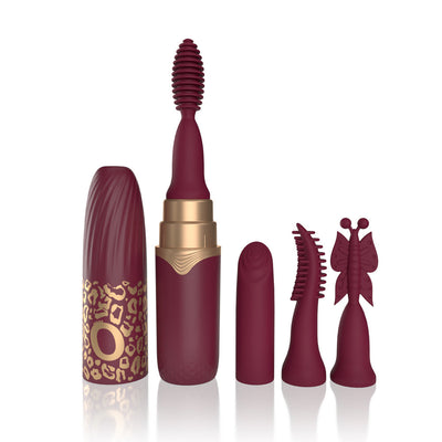 Merlot-colored rechargeable vibrating lipstick with four interchangeable silicone tips and decorative cap.
