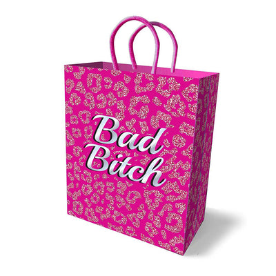 Bright pink gift bag with glittery leopard print and bold white "Bad Bitch" text, featuring sturdy woven handles.