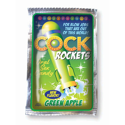 Green Apple flavored Cock Rockets oral candy pack with colorful rocket design and playful text on silver foil packaging.