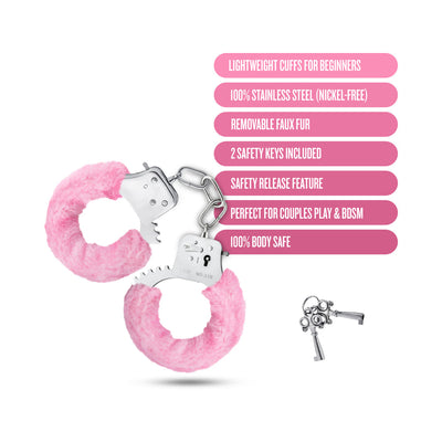 Pink faux fur covered stainless steel beginner cuffs with two safety keys and product feature text on white background.