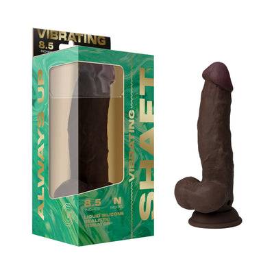 Realistic dark brown vibrating dildo with suction cup base next to green and gold packaging box labeled Vibrating Model N 8.5"