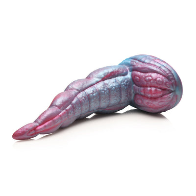 Iridescent red and blue silicone tentacle dildo with textured suckers and wide suction cup base on white background.
