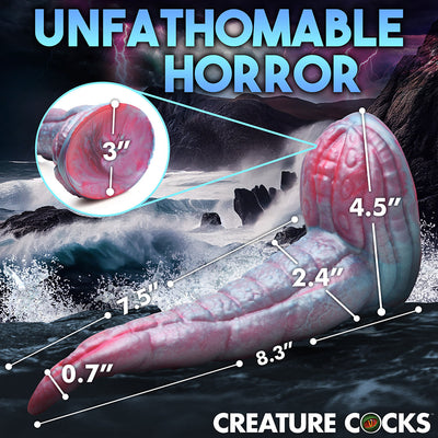 Red and blue silicone tentacle dildo with textured suckers and suction cup base, shown with size measurements on stormy ocean background.