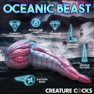 Iridescent red and blue silicone tentacle dildo with suction base, textured surface, and fantasy design against stormy ocean backdrop.