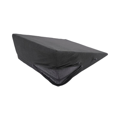 Black wedge-shaped positioner with removable zippered cover and water-resistant liner visible inside.