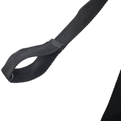 Close-up of black adjustable nylon strap with stitched loop detail for secure attachment.