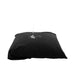 Black Sportsheets Pivot Pillow Protector with water poured on top, demonstrating its waterproof feature.