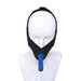 Black neoprene face strap-on with blue silicone attachment displayed on white mannequin head.