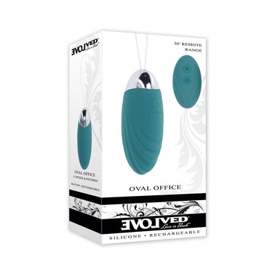 Evolved Oval Office rechargeable teal silicone vibrating egg with remote control shown on product packaging.