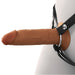 Brown 6-inch hollow silicone strap-on with black adjustable nylon harness on mannequin side view.