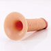 Hollow silicone strap-on dildo in flesh tone with a flared base, designed for comfort and versatility.