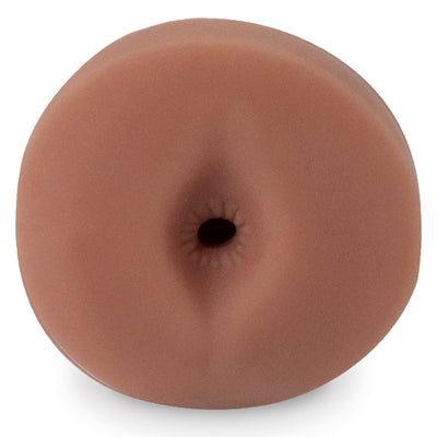 Close-up of a brown, lifelike textured adult toy designed for realistic feel and use.