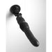 Black silicone thrusting vibrator with suction cup base mounted on white tiled wall.