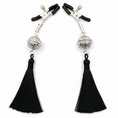 Pair of silver-tone adjustable nipple clamps with black rubber tips and decorative black tassels on a white background.