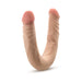 Beige double-ended posable dildo with realistic texture and detailed veining on a white background.