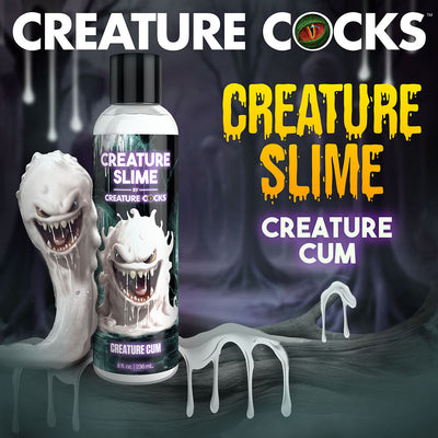Bottle of Creature Slime unscented lubricant with animated white slime creatures and dripping slime graphics on dark background.