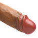Close-up of realistic silicone dildo tip in dark skin tone with detailed texture and natural color variation.