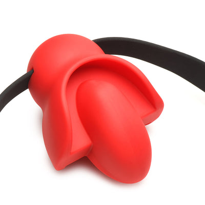 Red silicone extreme gag with mouthguard design and adjustable black locking strap on white background.