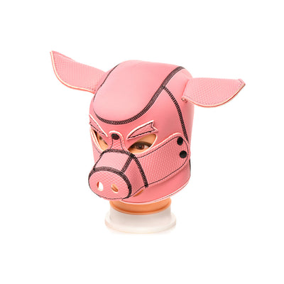 Pink neoprene hood designed with pig ears and snout details on a mannequin head.