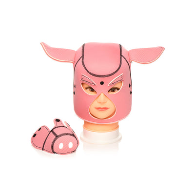 Pink neoprene pig hood with ears and matching snout accessory displayed on mannequin head