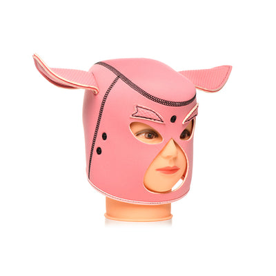 Pink neoprene hood with pig ear details and cutouts for eyes and mouth on a mannequin head.