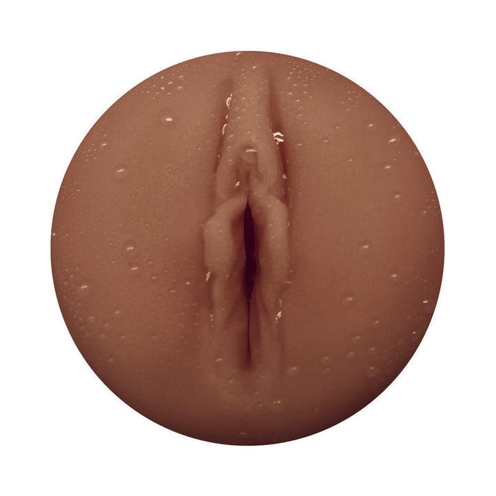 Close-up of the Masturmate Vagina Mocha male masturbator in mocha color with textured surface.