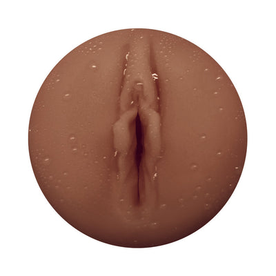 Close-up of the Masturmate Vagina Mocha male masturbator in mocha color with textured surface.