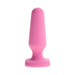 Pink petite silicone plug with flared base, smooth rounded tip, and compact design for comfortable use.