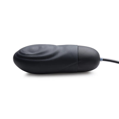 Black silicone textured pulsing bullet with attached control bulb and USB charging cord on white background.