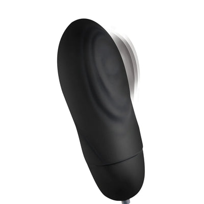 Black silicone bullet vibrator with textured ridges and pulsing motion effect on a white background.
