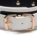 Close-up of white PU leather collar with gold metal buckle and stitching detail