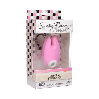 Pink Sucky Bunny silicone clitoral stimulator in clear packaging with checkered design and product details visible.