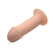 Beige squeezable phallic dildo with suction cup base, made from smooth, flexible silicone on white background.