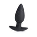 Black silicone tapered vibrating butt plug with wide base for comfortable wear and remote control use.