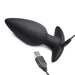 Black silicone vibrating butt plug with USB charging cable on white background.