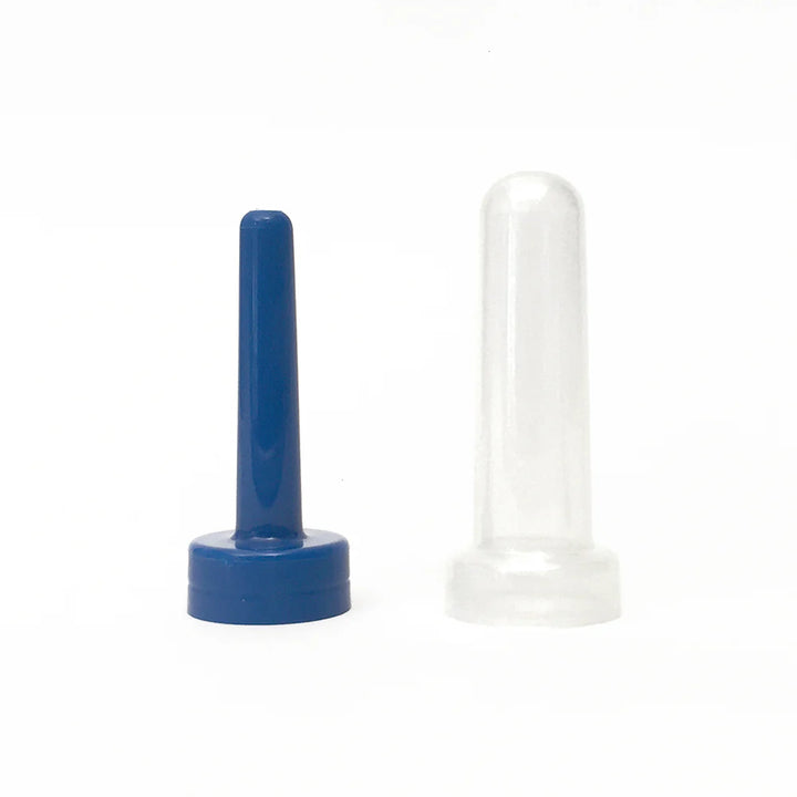Blue plastic enema nozzle adapter with matching clear sanitary storage cap on white background.