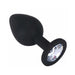 Black silicone butt plug with tapered tip and clear jewel base for elegant training and pleasure.