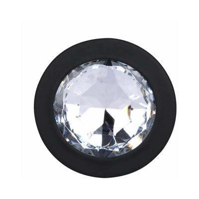Close-up of black silicone base with large clear jewel accent from a Me You Us Trio of Jewels butt plug set.