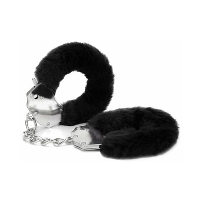 Black furry handcuffs with metal chain and locking mechanism on white background.