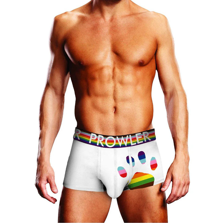 Male model wearing white Prowler trunks with rainbow paw print and matching rainbow waistband.