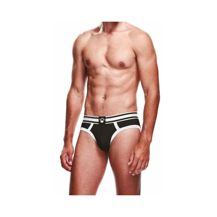 Male model wearing black and white Prowler brief with two-tone waistband and paw logo.