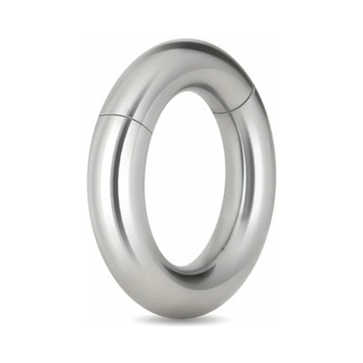 Polished stainless steel magnetic cock ring with smooth, rounded design and secure locking mechanism.