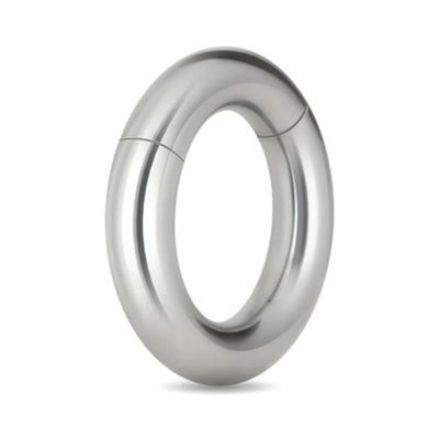 Polished stainless steel magnetic cock ring with smooth, rounded design and secure locking mechanism.