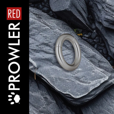 Silver steel magnetic ring displayed on textured gray stone with Prowler Red branding on the side panel.